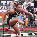 Spartan Claire Hungerford qualifies for the 100 and 300 hurdle finals.