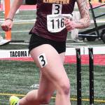 Kingstons Leighton Menge competes in the 100 hurdles.