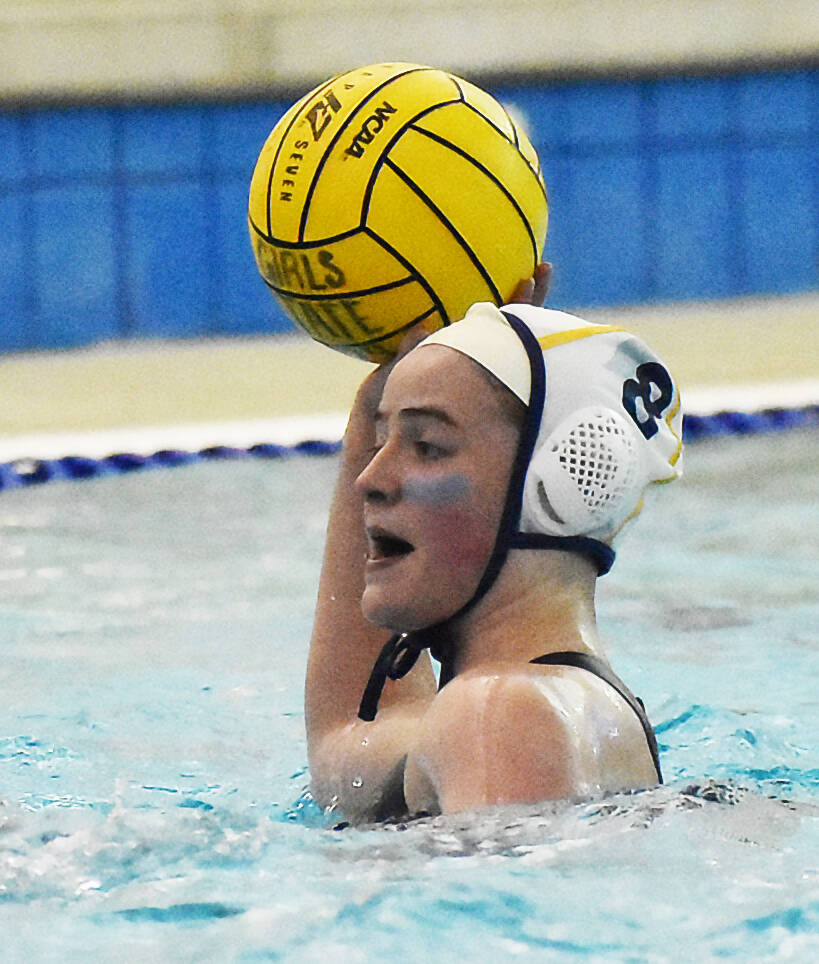 Spartan Allie Paulson-Houser looks to make a pass to her teammate.
