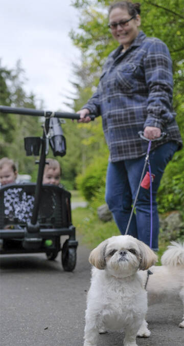 Shelly Bryndza takes her kids and dogs for a walk around the campground.