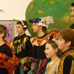 Students gather to sing a closing number for the West African musical.