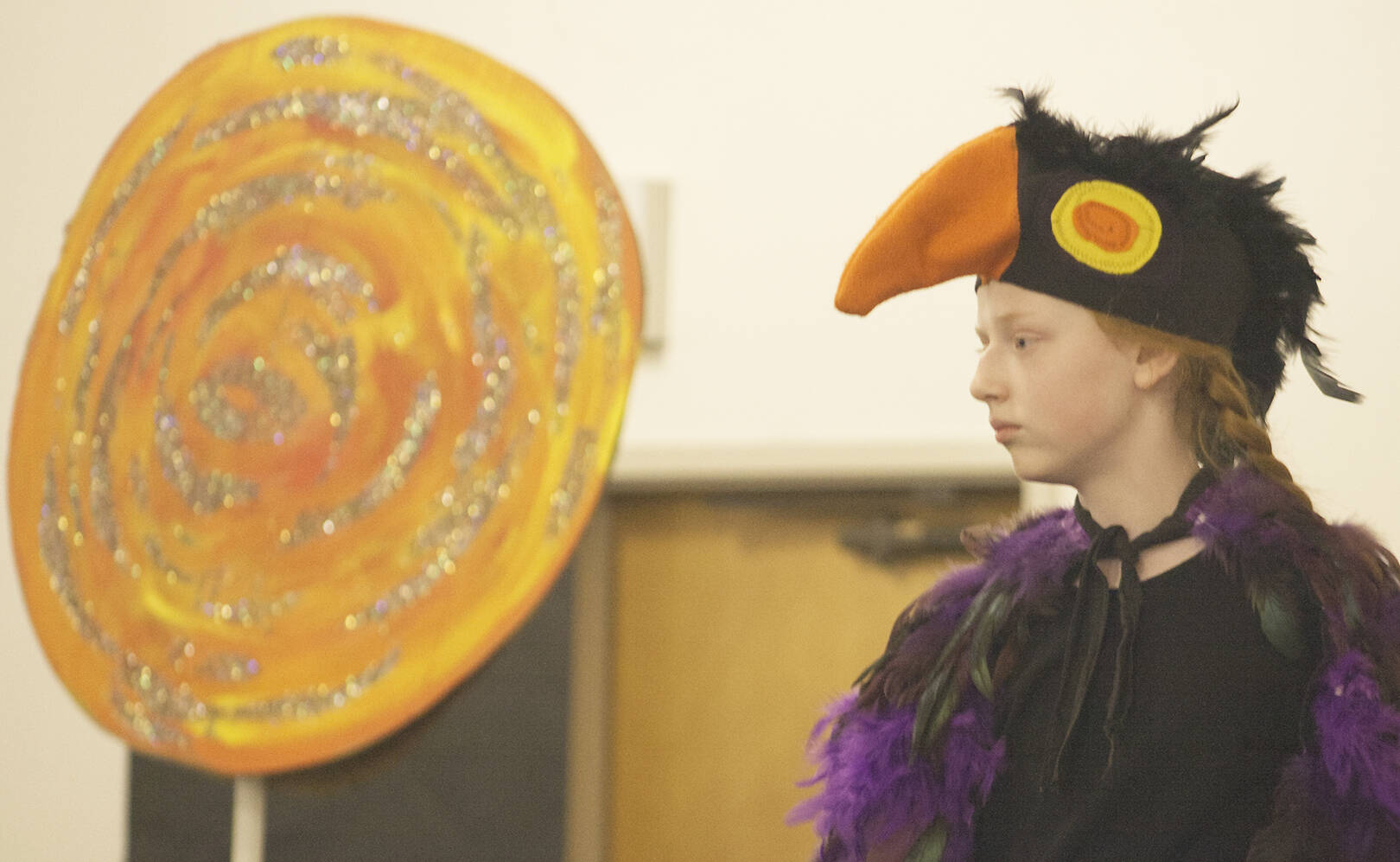 Molly Hetherwick/Kitsap News Group photos
Kate Bomke, the Crow, looks on as the sun beams down on the chaos unfolding on the savannah.