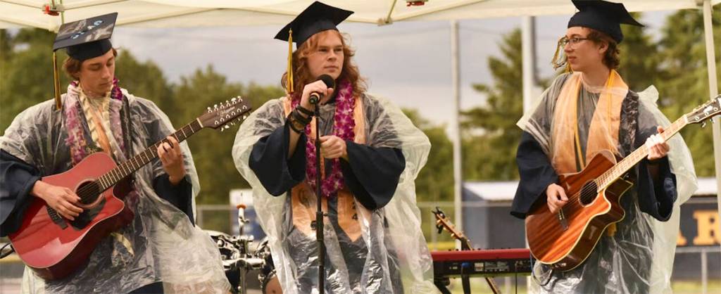 This trio of musicians performs at the graduation ceremony.