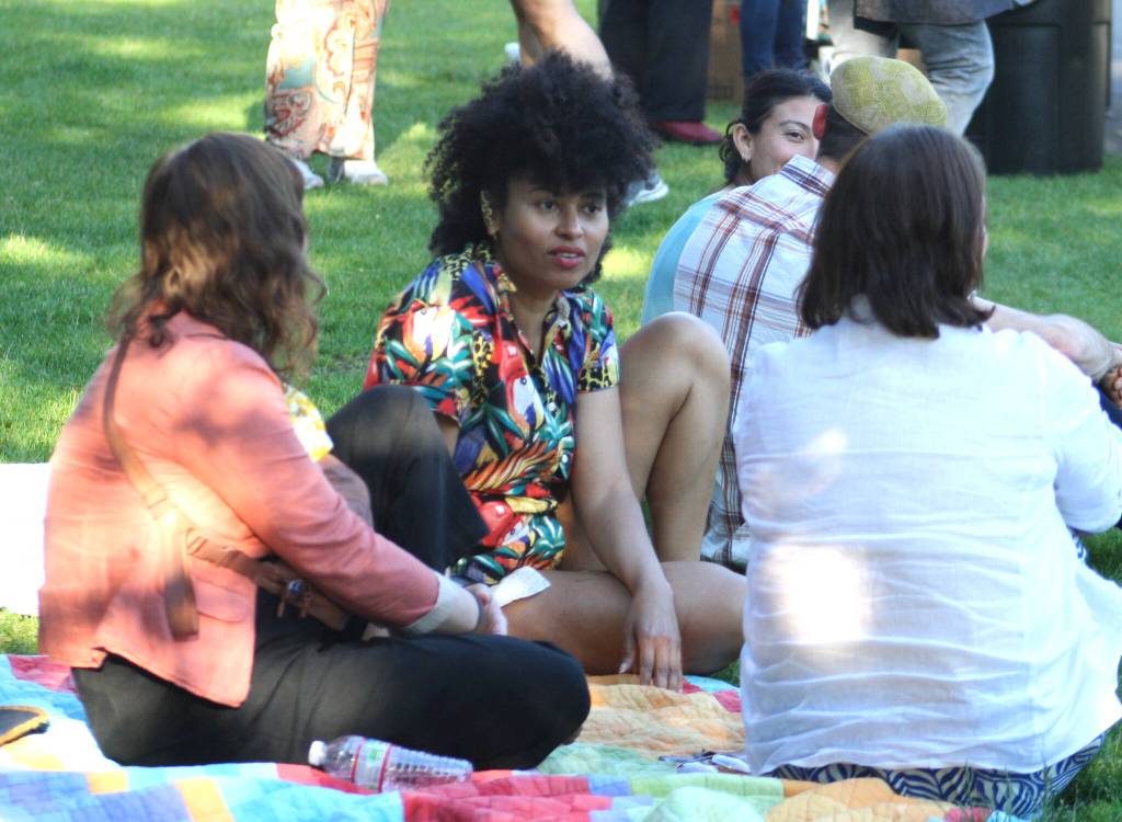 Three friends enjoy the festivities at BIs Juneteenth event.
