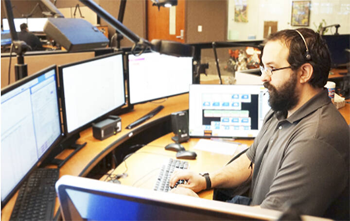 Kitsap 911 courtesy photo
Randy Dasho works a shift as a 911 dispatcher for Kitsap County.