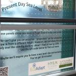 The present-day decal explaining the threats of sea level rise.