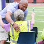 Kelvin Solsberry, left, Dave Snyder's cousin, hugs and consoles Snyder's aunt Jane before the ceremony.