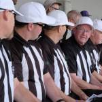 Referees from the Peninsula Football Officials Association show up in uniform to show their support for coach Dave Snyder.