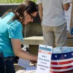 Parade attendees were invited to write a message to be shot into the sky for the night's firework show.