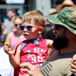 Elisha Meyer/Kitsap News Group photos
Flint Getchell tastes victory with a donut and a first-place prize at the annual Manchester Kids and Pet Parade.