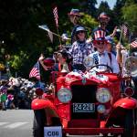 Jonathan Palmer courtesy photos
Uncle Sam drives an antique vehicle packed with folks in July 4 regalia in front of the many visitors who attended the Grand Old 4th of July in Bainbridge Island Thursday.