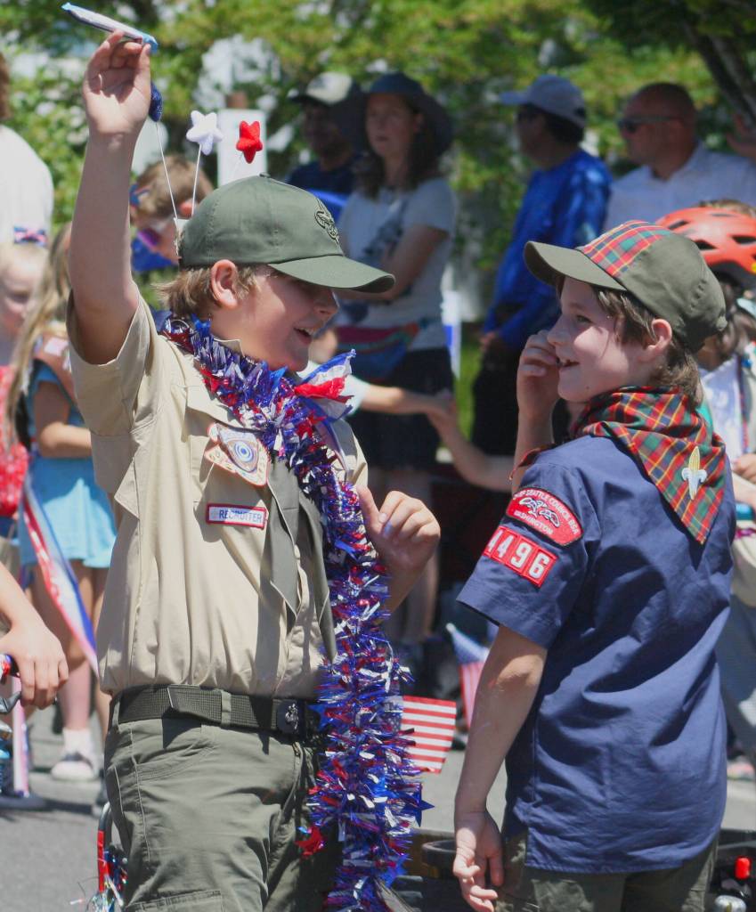 Boy Scout Troop 4496 handed out candy and rode their bikes in the parade.