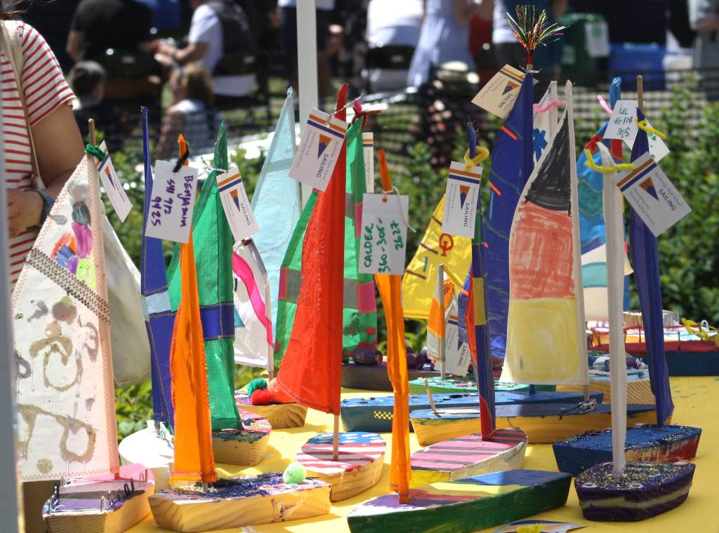 The Bainbridge Sailing Center hosted a build-your-own boat station for kids with wooden boats, paint and string.