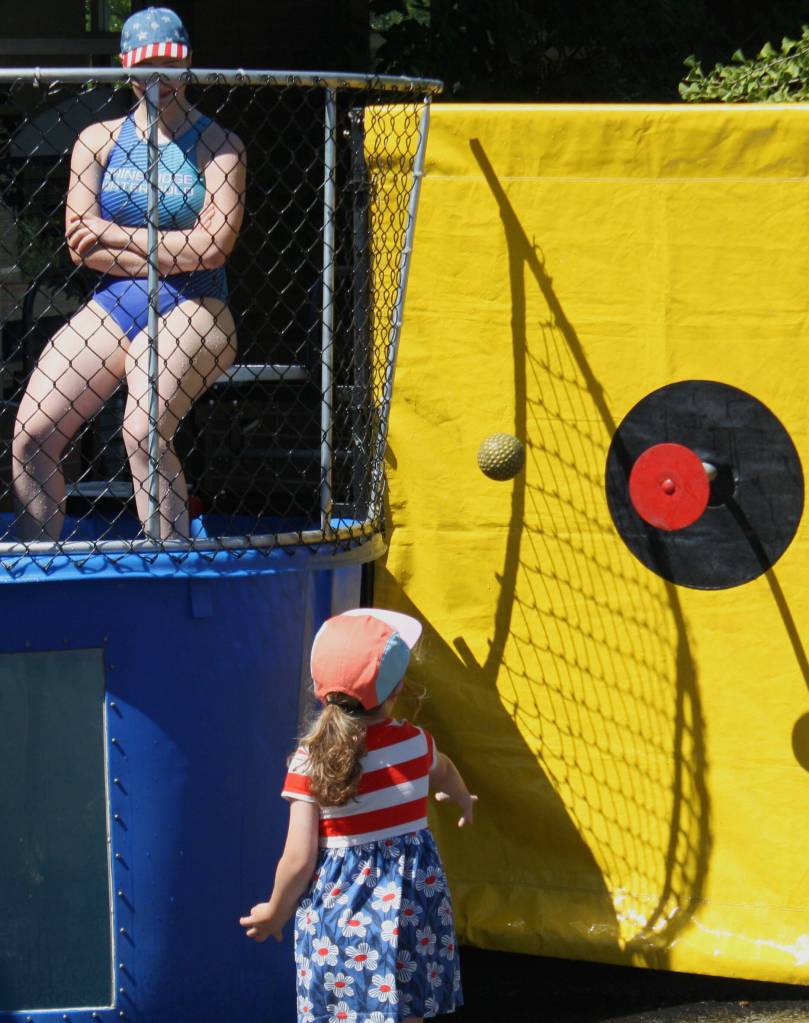 Bainbridge Aquatics held a dunk tank fundraiser, with members of the team on the block.
