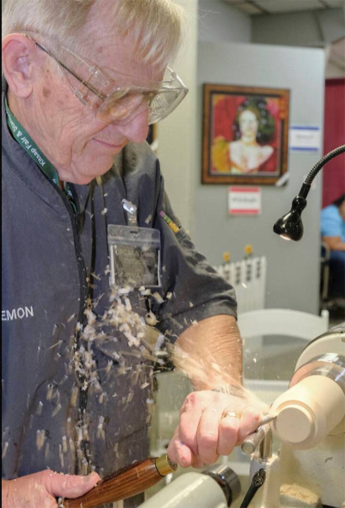 Fair institution Larry Lemon turns a mean lathe.