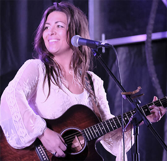 Kara Hesse enjoys herself onstage at the festival.