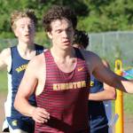 Kingston freshman Coen Van Vliet beats a pair of Bainbridge runners to the finish line.