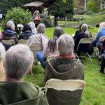 Bloedel courtesy photo 
Bainbridge Island poet laureate Michele Bombardier welcomes guests to a poetry reading at the Bloedel Reserve honoring renowned poet Theodore Roethke, who died there in 1963.