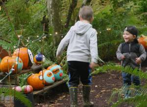 Molly Hetherwick/Kitsap News Group photos
Local plant nursery Bainbridge Gardens invites the community to decorate its adjacent nature trail with pumpkins this Halloween. A few beloved film, TV and comic book characters also decided to make an appearance. Here, two young residents recognize a few favorite characters from Studio Ghibli film Spirited Away.