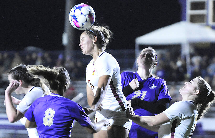 Michael Dashiell/Sequim Gazette courtesy photo
Kingstons Kate Collins gets her head on the ball in the first half of a Buccaneer 3-2 overtime win in Sequim Oct. 8.