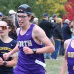 Michael Sanders of Bainbridge and Alex Braun and Sam Corry of NK sprint to the finish line at Battle Point Park.
