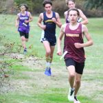 Kingstons Micah Richards leads his group of runners around the corner in the middle of a race.