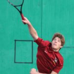 Kingstons Joshua Vanhuis makes a serve in the first match of the league tournament.