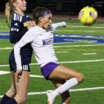 Viking freshman Vianny Garcia Deluna battles for the ball with BHS senior Arden De Lanoy.
