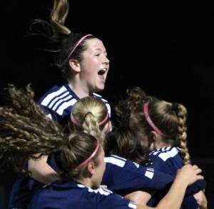 Elisha Meyer/Kitsap News Group photos
Spartan players celebrate after Magda Rufo-Hill scores the only goal of the match to win 1-0 over North Kitsap Oct. 29.