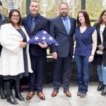 Tricia, in white coat, Bill Jr., David and his wife Amanda and their children at Bill Bergeron Sr.s funeral.