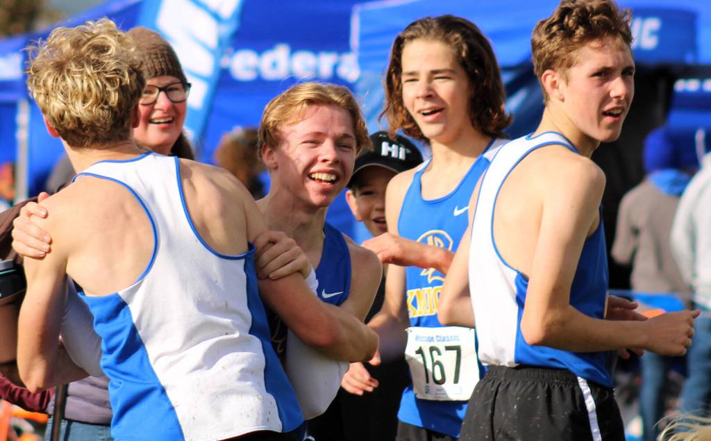 Bremerton celebrates after finding out the boys team qualified for state.