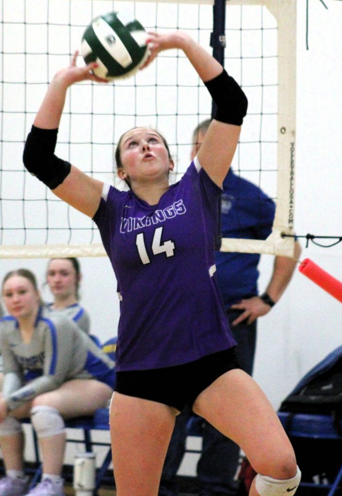 North Kitsap senior Teegan DeVries sets the ball for a Viking attack.