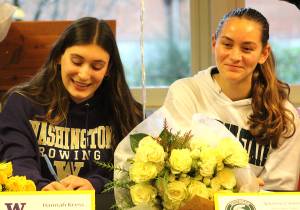 Elisha Meyer/Kitsap News Group
Bainbridges Hannah Kress and Adeline Carleton celebrate their rowing commitments to Washington and Michigan State.