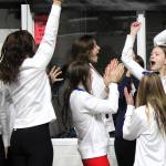 Elisha Meyer/Kitsap News Group photos
Bainbridge swimmers rejoice after officials announce the Spartans won their first WIAA state championship since 2021.