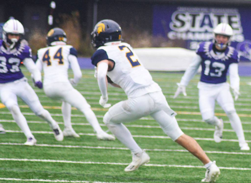 Hugh ONeil (2) of Bainbridge returns a kick against the Seahawks.