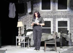 Molly Hetherwick/Kitsap News Group photos
Working-class greaser Ponyboy (Lily Terp) reads an inscription in a friends book.