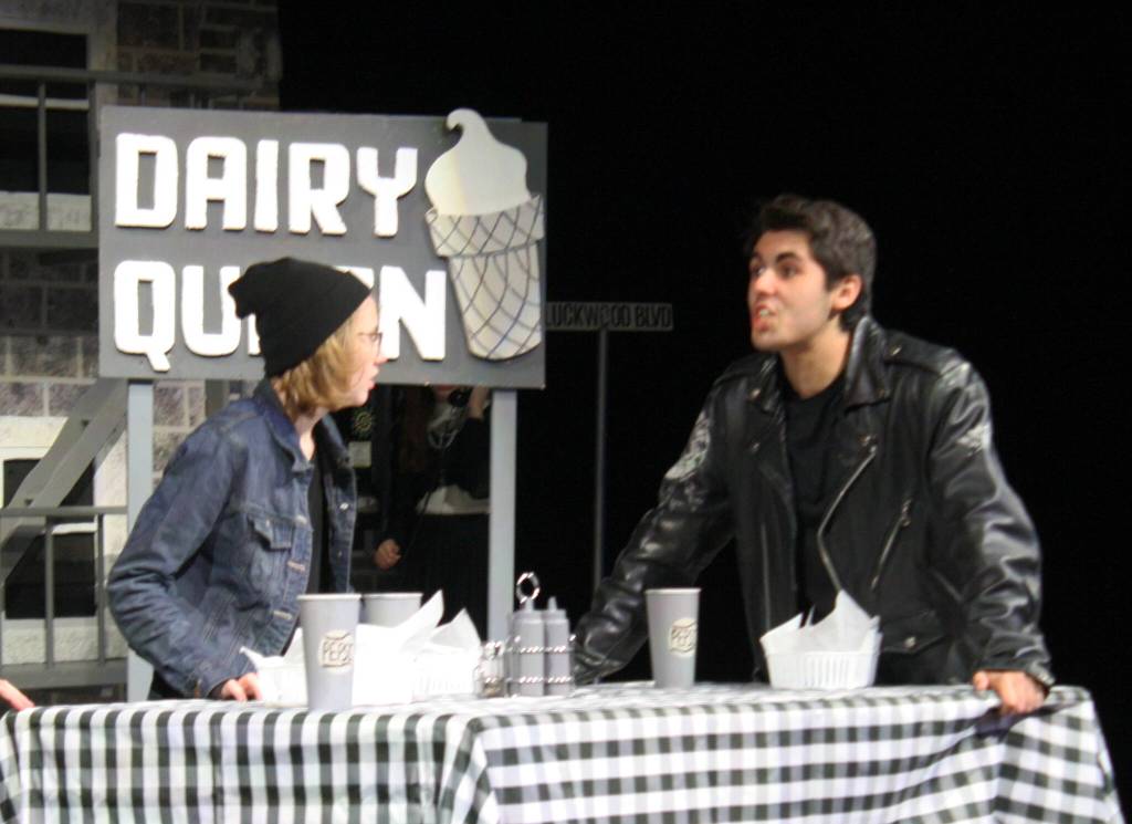 Greasers Johnny (Rel Eerkes, left) and Dallas (Peyton Wright) during a scene at the Dairy Queen diner.