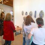 Coney courtesy photo
Isobel Coney, left, speaks to some gallery visitors about her art, displayed on the wall at Grace Episcopal Church.
