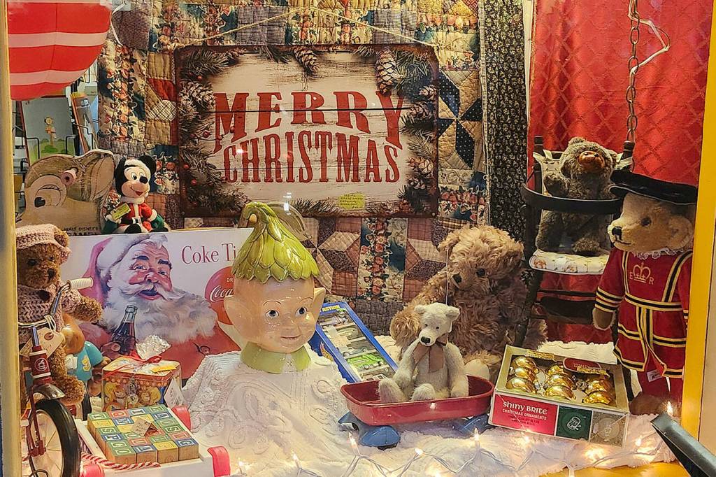 Holiday decor is displayed in a downtown Poulsbo storefront.