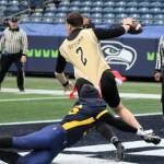 Armys quarterback escapes being sacked, but an endzone penalty gives Navy a safety.