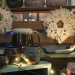 Ceramic art for sale with a snowflake theme at the Winter Night Market.