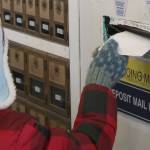 Once they arrived at the post office, those who wrote letters placed them in the mail slot.