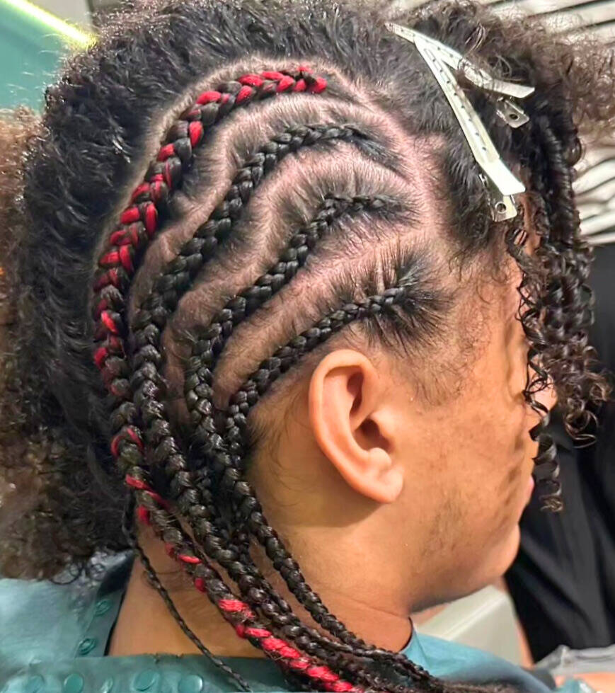 Jewel Shepherds braidwork, complete with colorful ribbon for style.