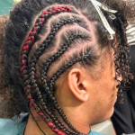 Jewel Shepherds braidwork, complete with colorful ribbon for style.