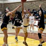 Luke Caputo/Kitsap News Group photos
Kingston junior Tati Fontes-Lawrence goes in for a contested layup in a 69-36 loss to Bainbridge Jan. 31 at Kingston High School.
