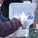 Some attendees selected paper cranes to place at the pole, courtesy of the BI Japanese American Exclusion Memorial.
