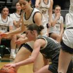 Viking Claire Inkleberger tries to get out of a double team in a 33-20 loss to Bainbridge Feb. 20 at Foss High School.