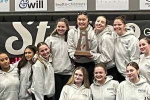 Bryn Lashmet courtesy photo
The Bainbridge Spartan gymnastics team celebrates its second-place finish at the state meet Feb. 21 at Sammamish High School.