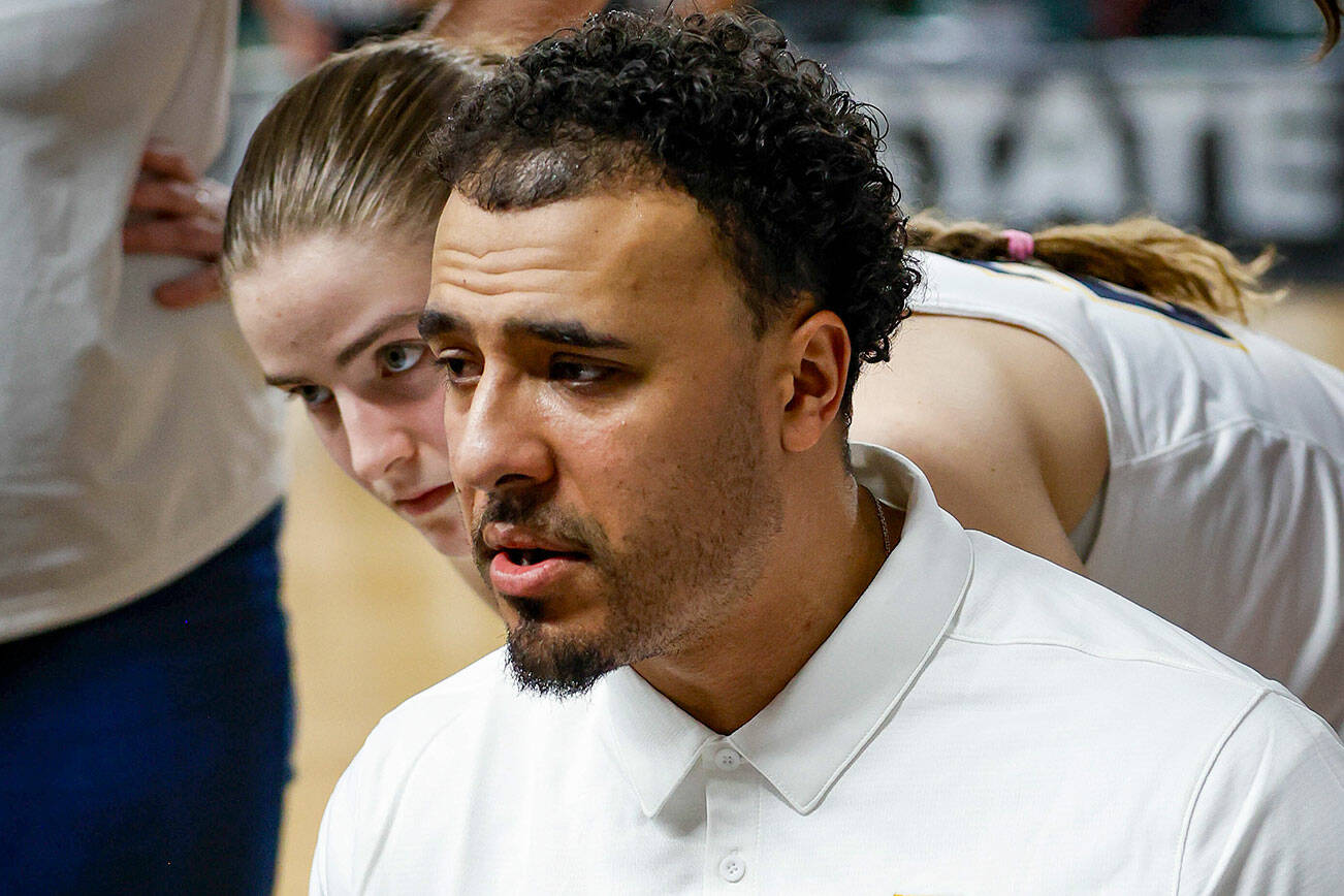 Bainbridge coach Zach Burnham talks to his team during a timeout.