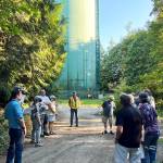 Community members learn about the citys plan to replace water Tank 2 located behind the softball field at Bainbridge High School.
